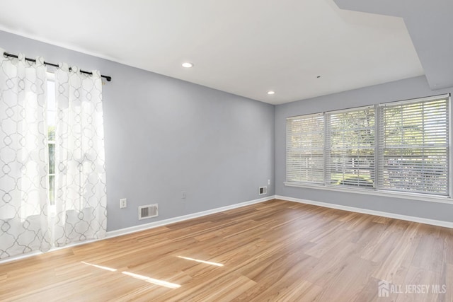 1 Lackland Ave, Piscataway, NJ 08854 - empty room with wood finished floors and recessed lighting