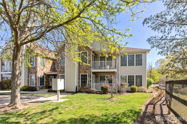 1 Lackland Ave, Piscataway, NJ 08854 - back of house with stone siding and a balcony