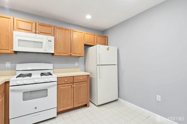 1 Lackland Ave, Piscataway, NJ 08854 - kitchen featuring white appliances, light countertops, and recessed lighting