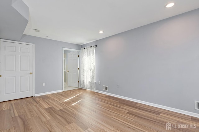 1 Lackland Ave, Piscataway, NJ 08854 - unfurnished bedroom with light wood-style floors and recessed lighting