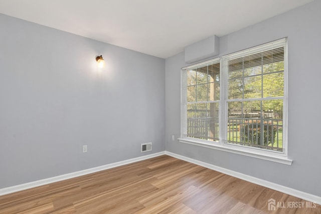 1 Lackland Ave, Piscataway, NJ 08854 - spare room with light wood-style floors and baseboards