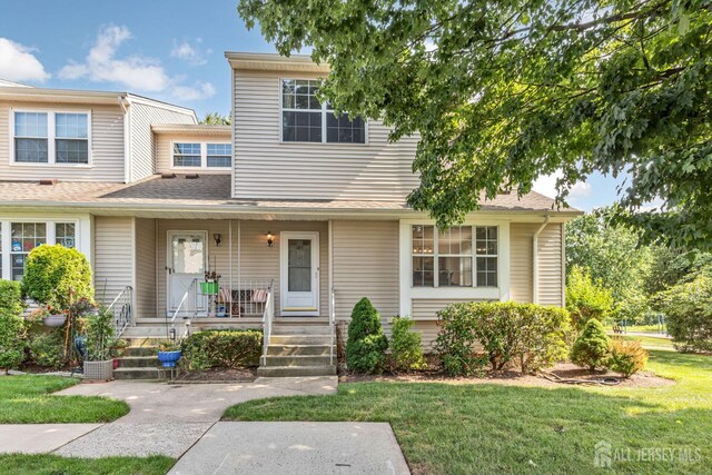 183 Driscoll Ct, Franklin Twsp, NJ 08873 - view of front of house with covered porch and a front yard