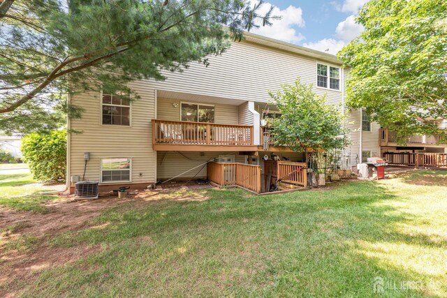 183 Driscoll Ct, Franklin Twsp, NJ 08873 - back of house with a yard and a wooden deck