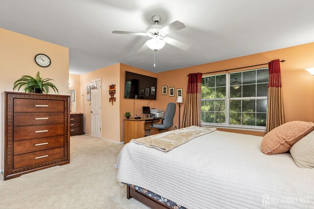 183 Driscoll Ct, Franklin Twsp, NJ 08873 - bedroom with light colored carpet, an office area, and a ceiling fan