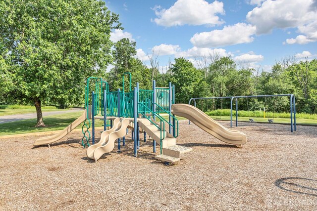 183 Driscoll Ct, Franklin Twsp, NJ 08873 - community jungle gym with view of wooded area