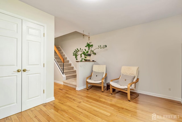 183 Driscoll Ct, Franklin Twsp, NJ 08873 - living area featuring light wood-type flooring and stairs