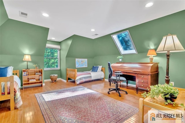 2 Danser Dr, Cranbury, NJ 08512 - bedroom with a skylight, wood finished floors, vaulted ceiling, and recessed lighting