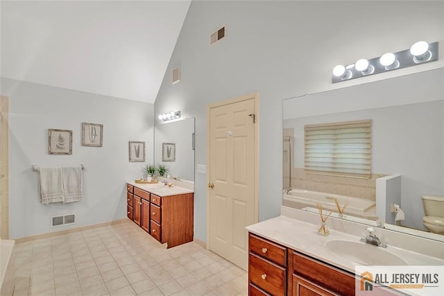 2 Danser Dr, Cranbury, NJ 08512 - full bath featuring high vaulted ceiling, vanity, a garden tub, and tile patterned floors