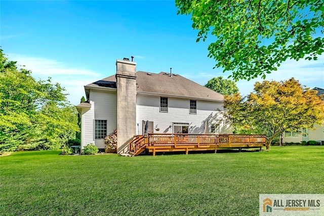 2 Danser Dr, Cranbury, NJ 08512 - back of house featuring a lawn, a wooden deck, and a chimney