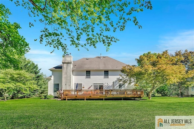2 Danser Dr, Cranbury, NJ 08512 - rear view of property with a wooden deck, a yard, and a chimney