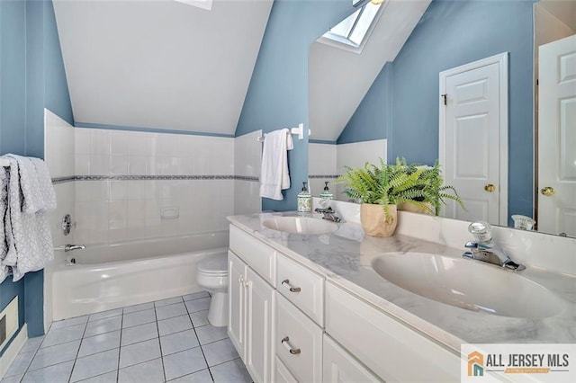 2 Danser Dr, Cranbury, NJ 08512 - full bath with a skylight, vaulted ceiling, tile patterned floors, a bath, and double vanity