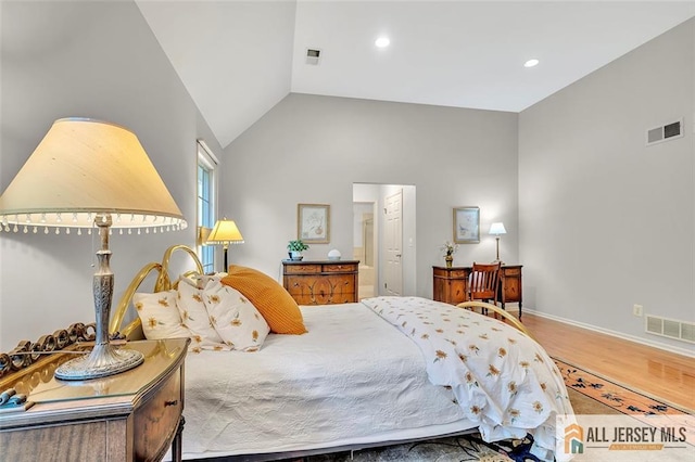 2 Danser Dr, Cranbury, NJ 08512 - bedroom with wood finished floors, vaulted ceiling, and recessed lighting