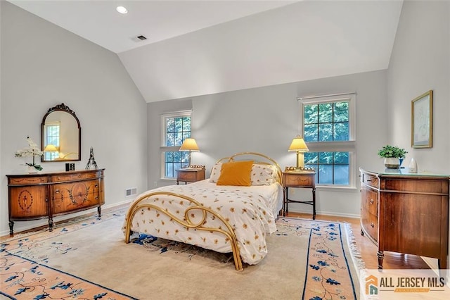 2 Danser Dr, Cranbury, NJ 08512 - bedroom with lofted ceiling and wood finished floors