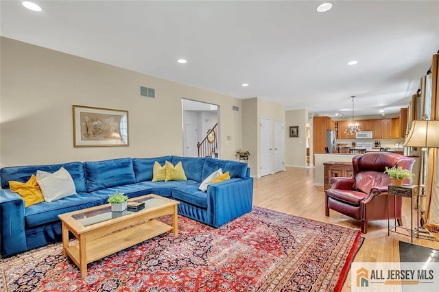 2 Danser Dr, Cranbury, NJ 08512 - living area featuring light wood-style floors, recessed lighting, and stairway