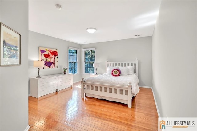 2 Danser Dr, Cranbury, NJ 08512 - bedroom featuring wood-type flooring and baseboards
