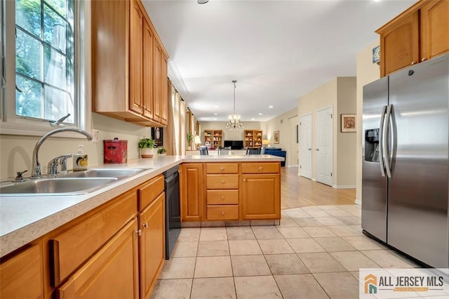 2 Danser Dr, Cranbury, NJ 08512 - kitchen featuring stainless steel refrigerator with ice dispenser, a peninsula, light countertops, open floor plan, and black dishwasher