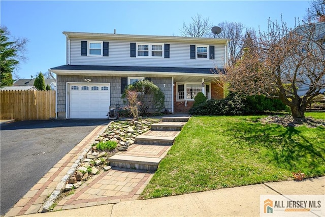 7 Hollywood St, South River, NJ 08882 - traditional home with asphalt driveway and an attached garage
