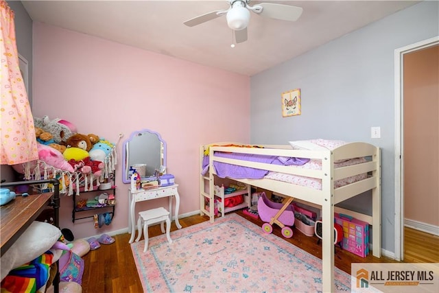 7 Hollywood St, South River, NJ 08882 - bedroom with wood finished floors and a ceiling fan