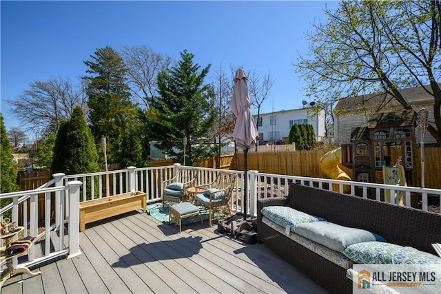 7 Hollywood St, South River, NJ 08882 - wooden terrace featuring a fenced backyard and outdoor lounge area