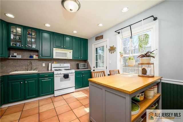 7 Hollywood St, South River, NJ 08882 - kitchen with white appliances, open shelves, decorative backsplash, green cabinetry, and wooden counters