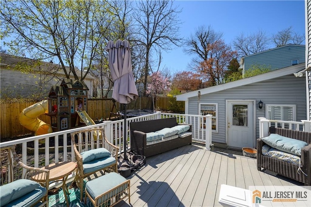 7 Hollywood St, South River, NJ 08882 - wooden terrace featuring a playground