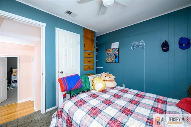 7 Hollywood St, South River, NJ 08882 - carpeted bedroom featuring ornamental molding and ceiling fan