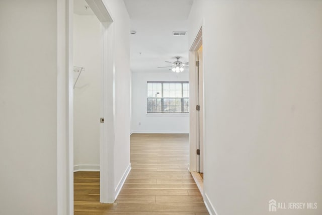 hall featuring light wood-type flooring