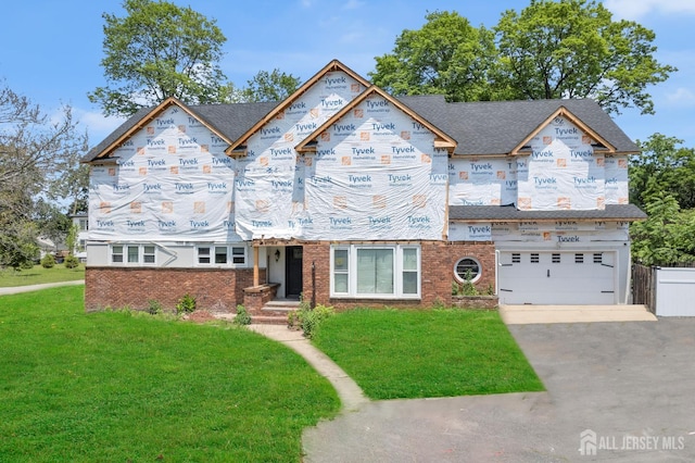 1595 Amwell Rd, Franklin Twsp, NJ 08873 - property in mid-construction with a garage, asphalt driveway, and brick siding