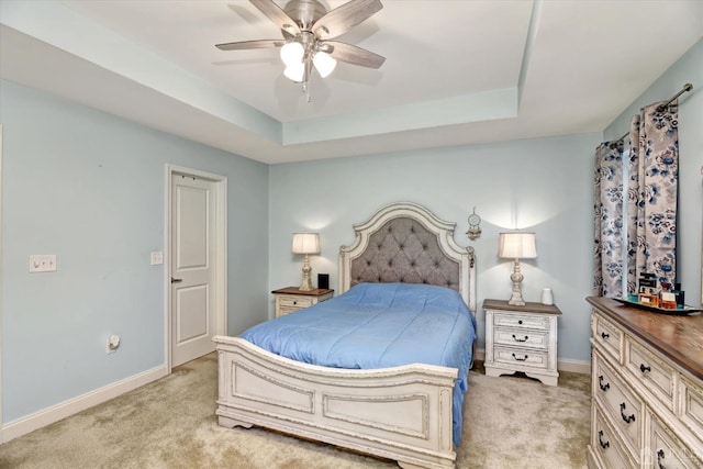 2206 Stelmaszek Rd, Sayreville, NJ 08859 - bedroom featuring light carpet, a tray ceiling, and a ceiling fan