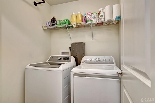 2206 Stelmaszek Rd, Sayreville, NJ 08859 - laundry room with washing machine and clothes dryer
