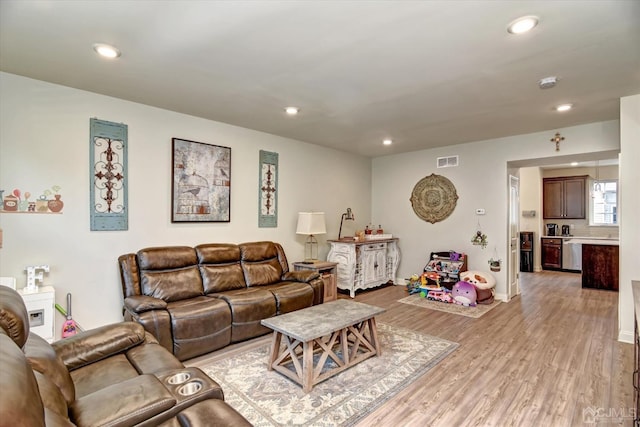 2206 Stelmaszek Rd, Sayreville, NJ 08859 - living room featuring light wood-type flooring and recessed lighting