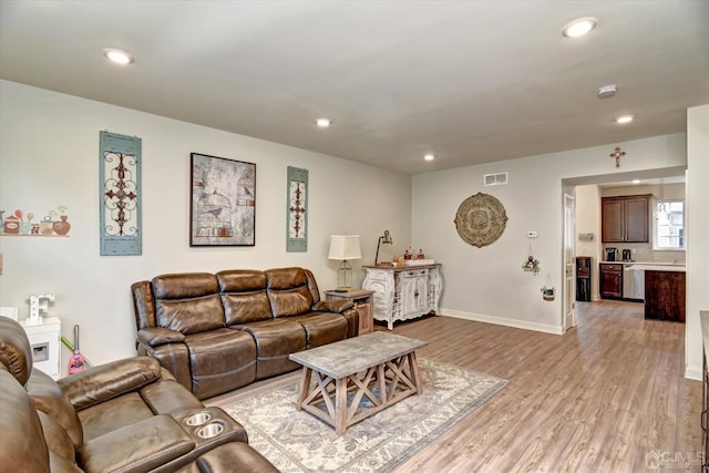 2206 Stelmaszek Rd, Sayreville, NJ 08859 - living room featuring light wood finished floors and recessed lighting