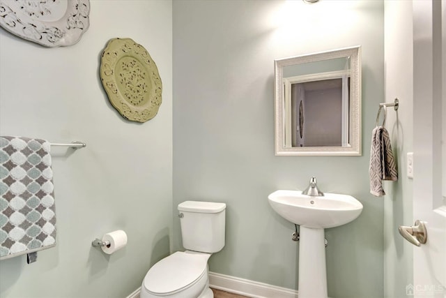 2206 Stelmaszek Rd, Sayreville, NJ 08859 - bathroom featuring toilet and baseboards