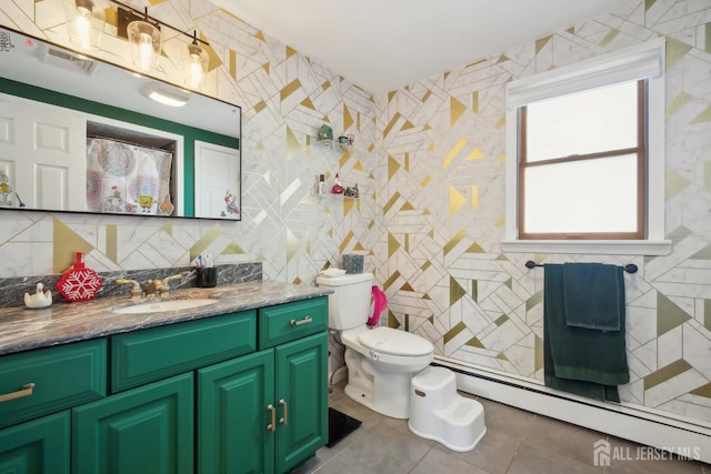 51 Greenbrook Rd, Middlesex, NJ 08846 - bathroom featuring tile walls, a baseboard radiator, vanity, and tile patterned flooring