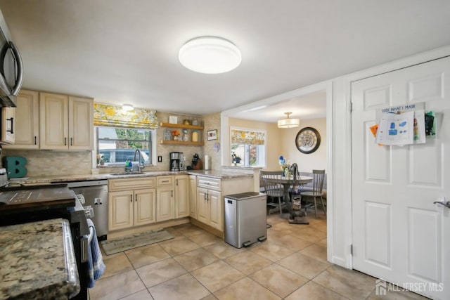 51 Greenbrook Rd, Middlesex, NJ 08846 - kitchen with healthy amount of natural light, light tile patterned floors, and backsplash