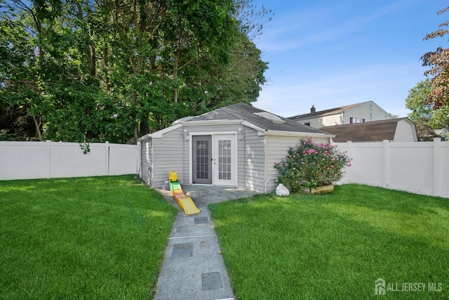 51 Greenbrook Rd, Middlesex, NJ 08846 - back of property featuring a fenced backyard, an outdoor structure, and french doors