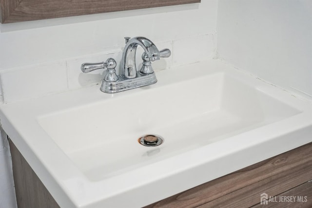 interior details featuring a sink