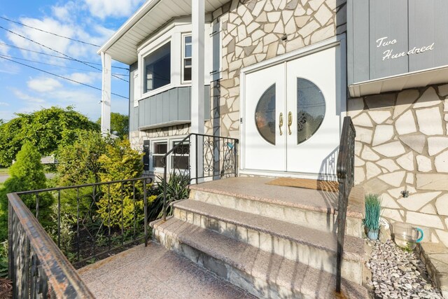 doorway to property with french doors