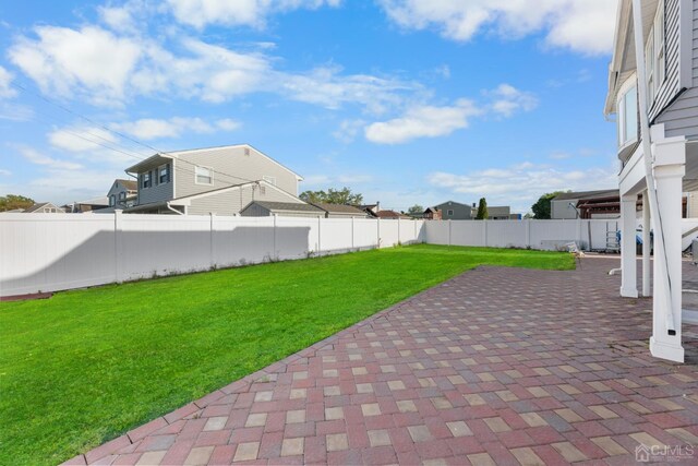 view of yard with a patio area