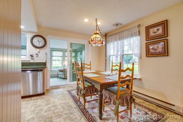 152 Chatham Dr Unit A, Monroe, NJ 08831 - dining space with a baseboard heating unit, a textured ceiling, recessed lighting, baseboards, and light stone finish floors