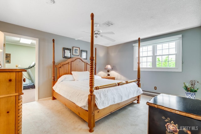 152 Chatham Dr Unit A, Monroe, NJ 08831 - bedroom featuring light carpet, a baseboard heating unit, and a ceiling fan