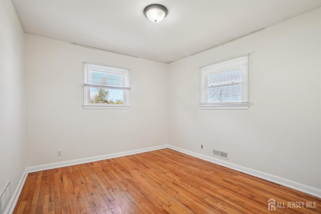 114 Woodrow Ave, Piscataway, NJ 08854 - unfurnished room featuring light wood-type flooring and baseboards