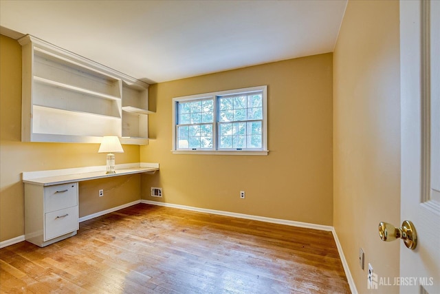4 Bodnarik Rd, Edison, NJ 08837 - unfurnished office featuring built in study area and light wood finished floors