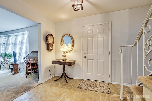 4 Bodnarik Rd, Edison, NJ 08837 - entryway with stairway and light carpet