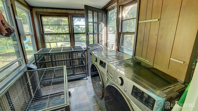 laundry area with washing machine and dryer