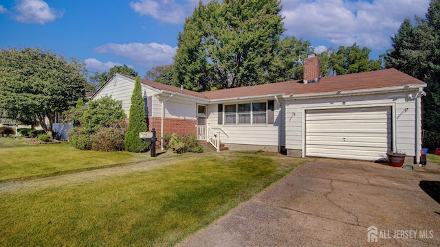 ranch-style home with a garage and a front lawn