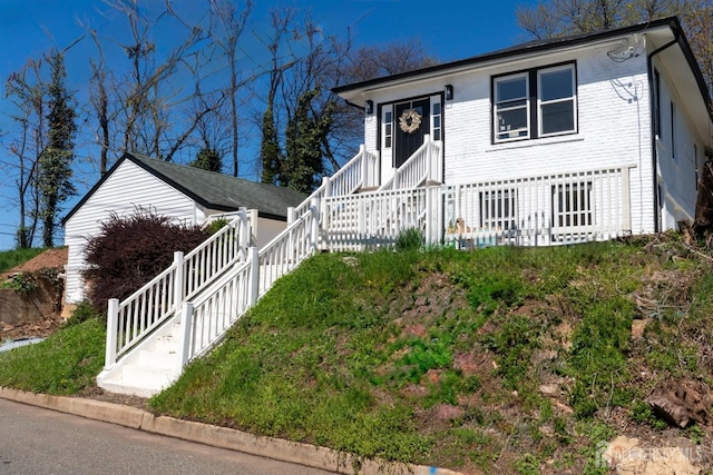 view of front facade with stairway