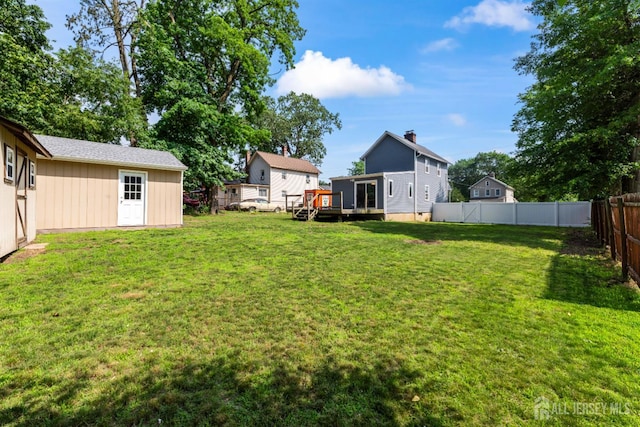 104 Old Matawan Rd, Old Bridge, NJ 08857 - fenced backyard with a wooden deck