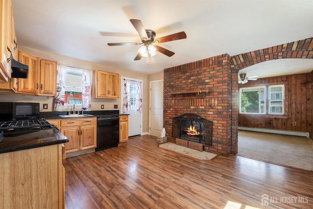 104 Old Matawan Rd, Old Bridge, NJ 08857 - kitchen with black appliances, a baseboard heating unit, a ceiling fan, and dark countertops
