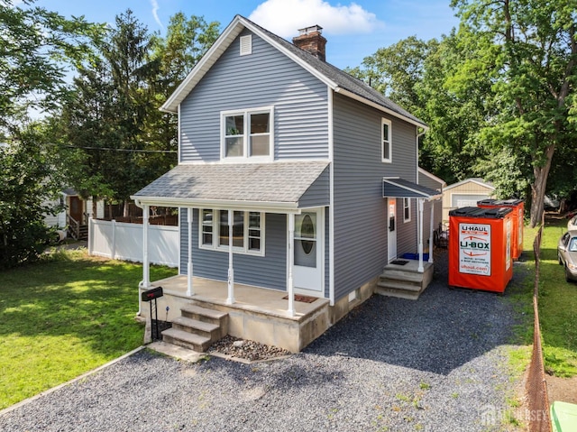 104 Old Matawan Rd, Old Bridge, NJ 08857 - view of front facade with a shingled roof, a chimney, and a porch